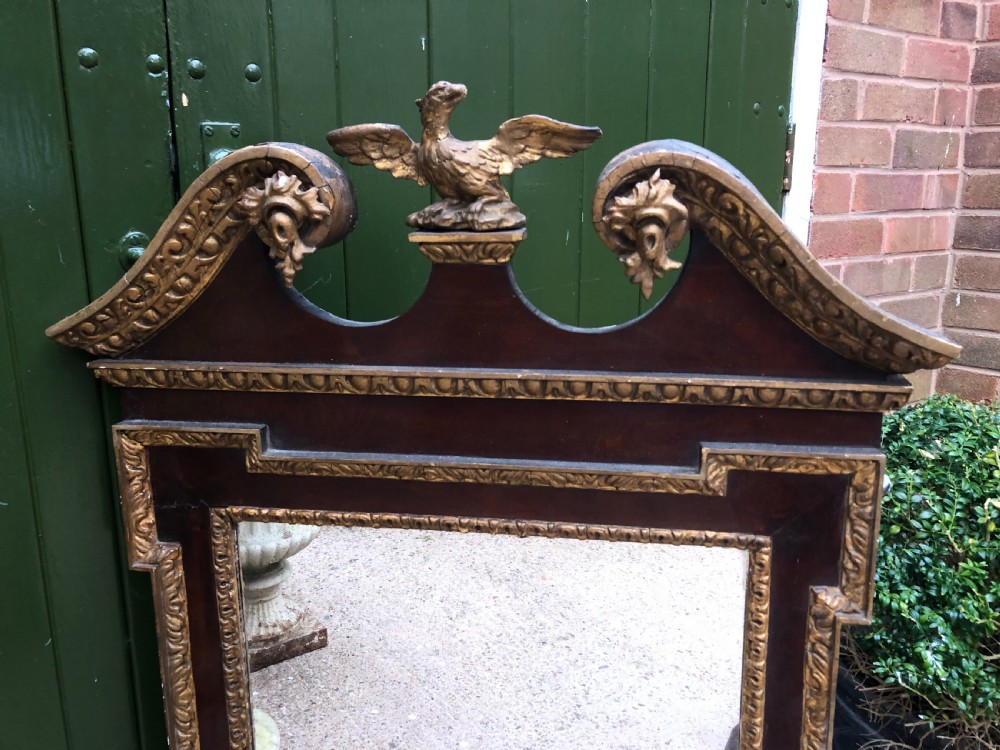 C19th George II period revival walnut and parcel-gilt framed mirror of impressive proportions. View VIII
