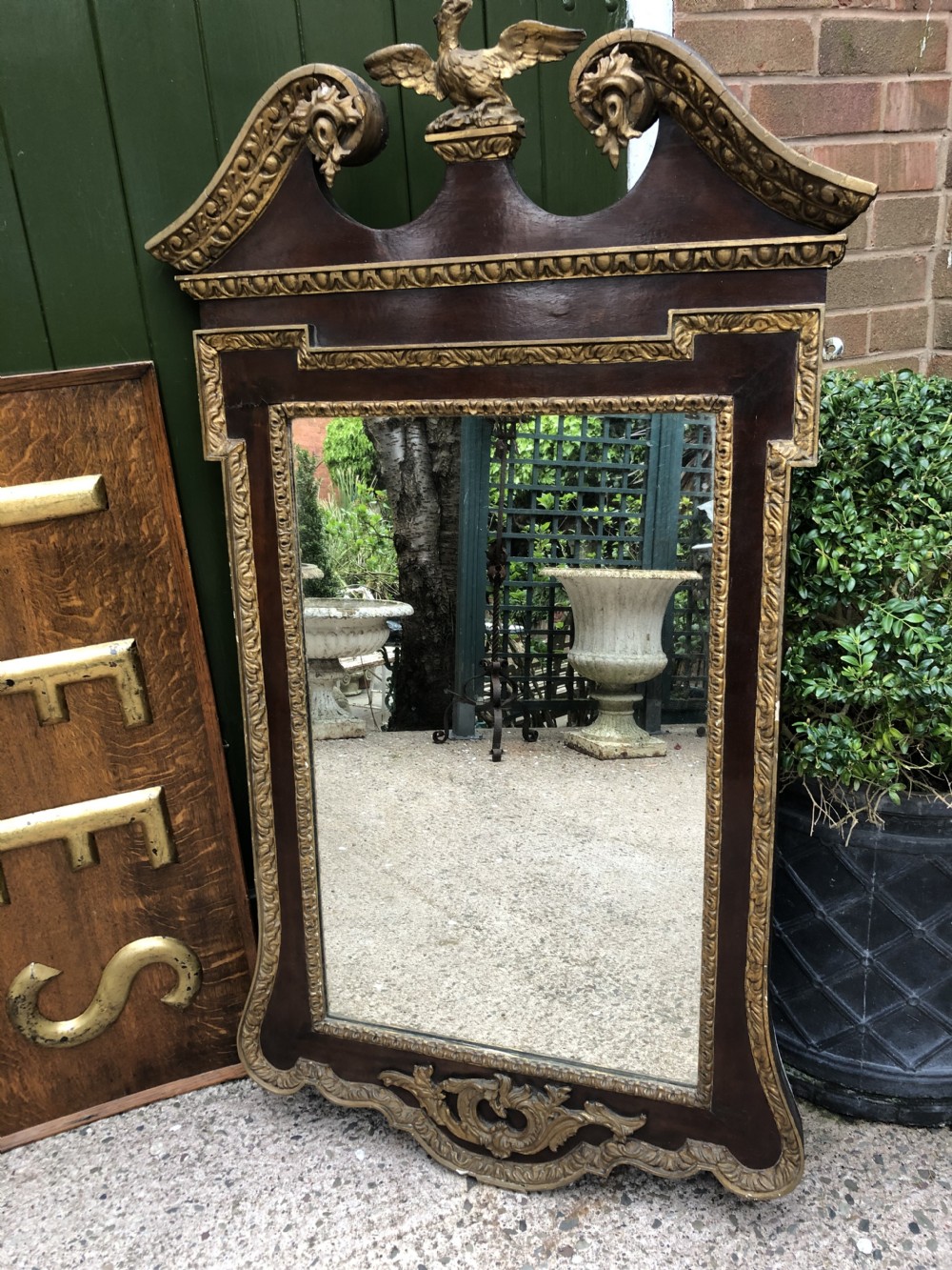 C19th George II period revival walnut and parcel-gilt framed mirror of impressive proportions. View II