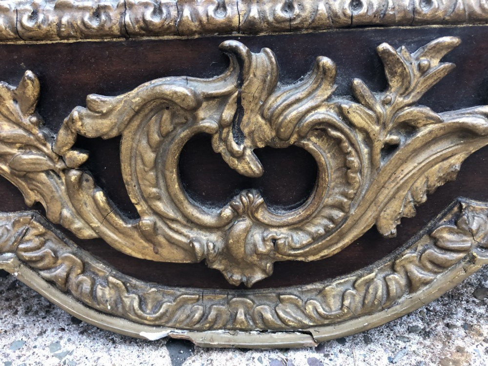 C19th George II period revival walnut and parcel-gilt framed mirror of impressive proportions. View XII