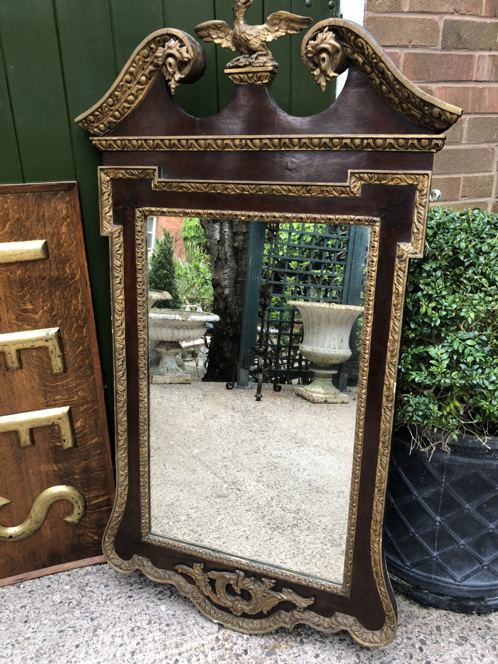 C19th George II period revival walnut and parcel-gilt framed mirror of impressive proportions. View XVII