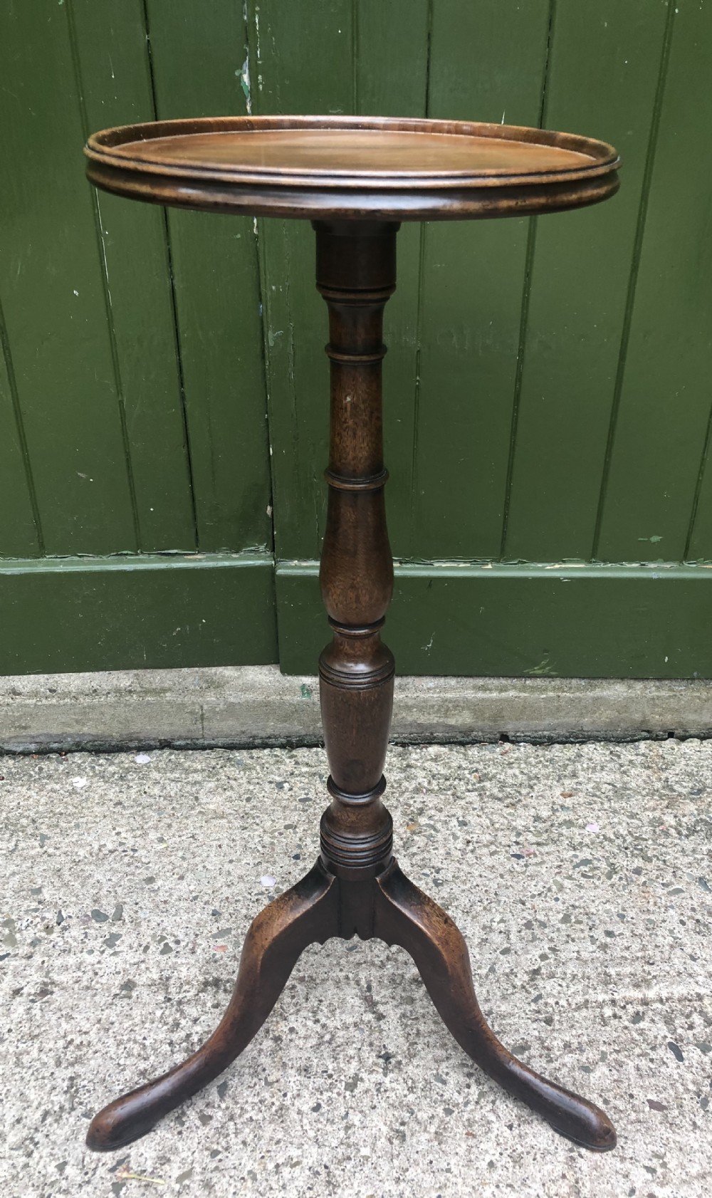 C18th George III period mahogany torchere or candlestand .