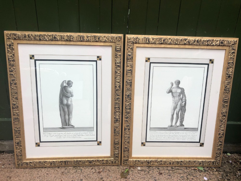 A pair of framed late 18th-century Neoclassical engravings depicting classical Greco-Roman statues in gilded wooden frames. View II