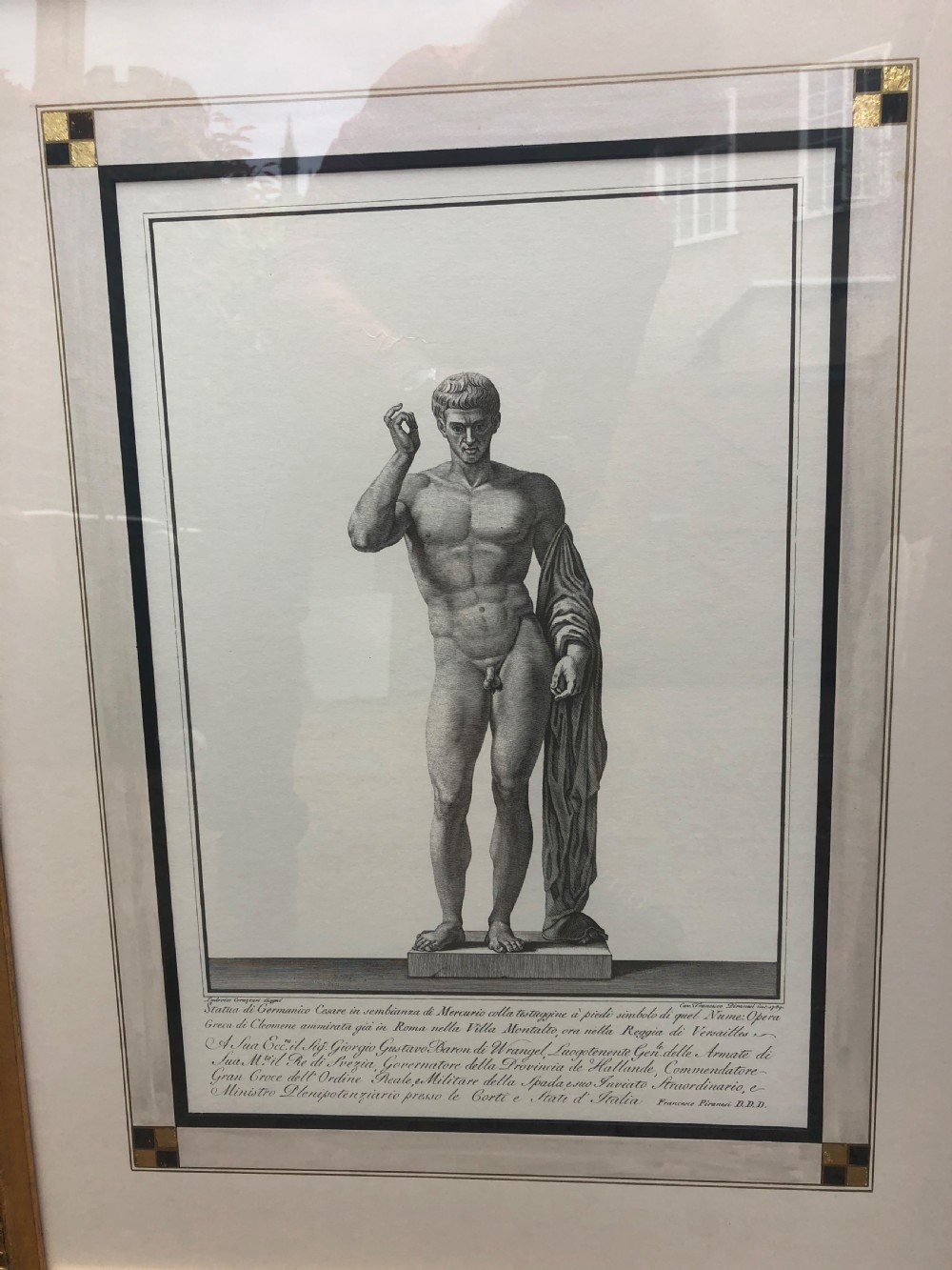 A pair of framed late 18th-century Neoclassical engravings depicting classical Greco-Roman statues in gilded wooden frames. View V