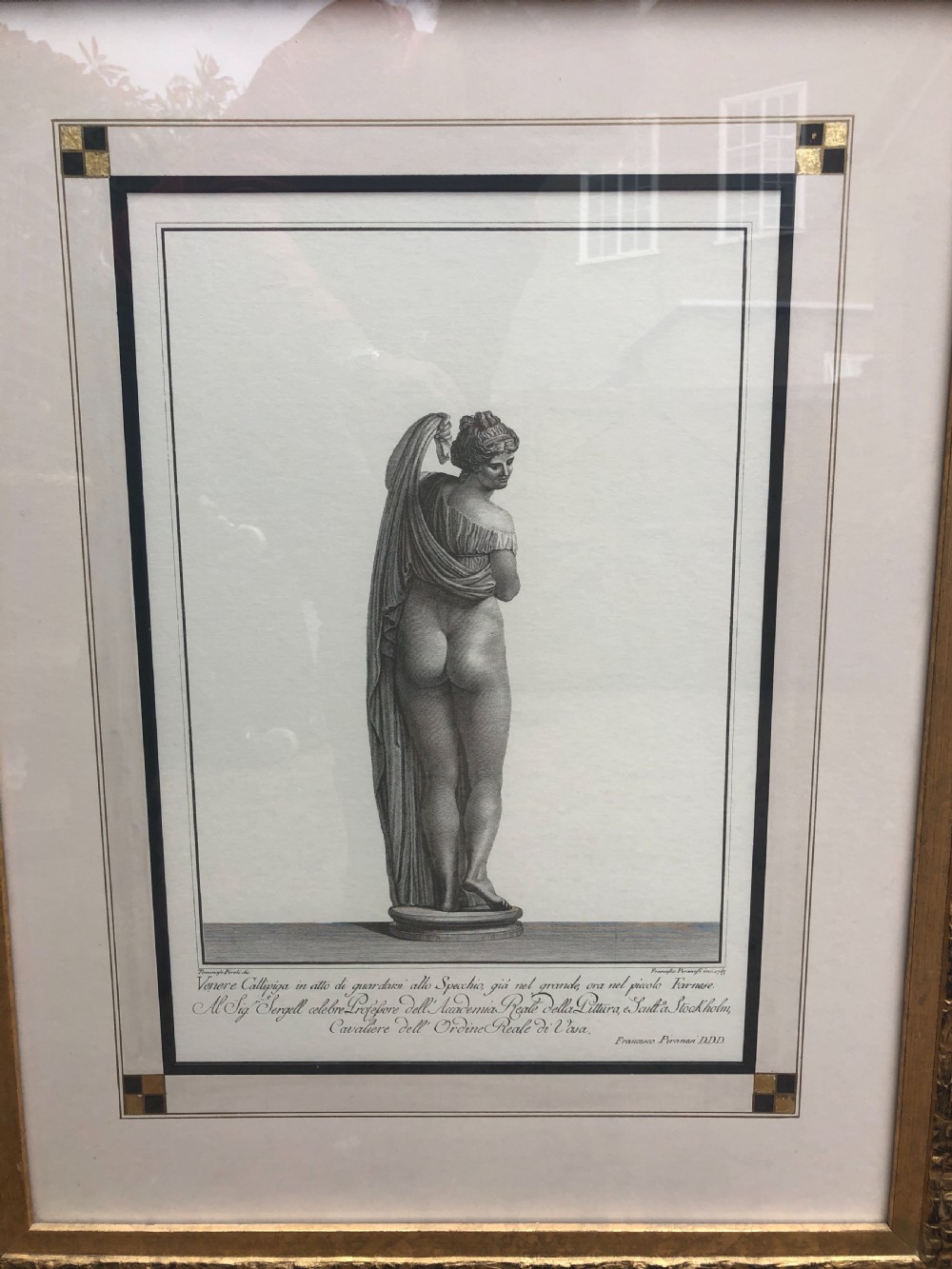 A pair of framed late 18th-century Neoclassical engravings depicting classical Greco-Roman statues in gilded wooden frames. View VII