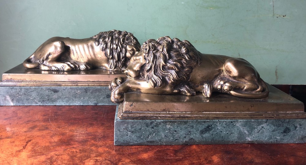 Pair of early C19th Italian ‘Grand Tour’ souvenir bronze lions after Antonio Canova.