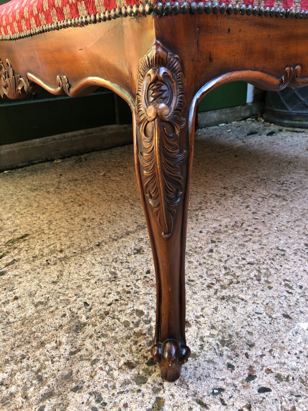 Large early C20th carved walnut-framed upholstered stool of mid C19th design. View IV