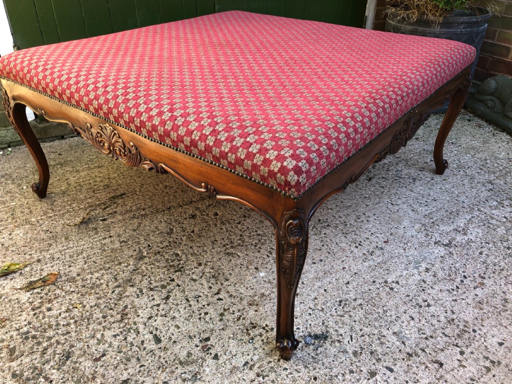 Large early C20th carved walnut-framed upholstered stool of mid C19th design. View VI