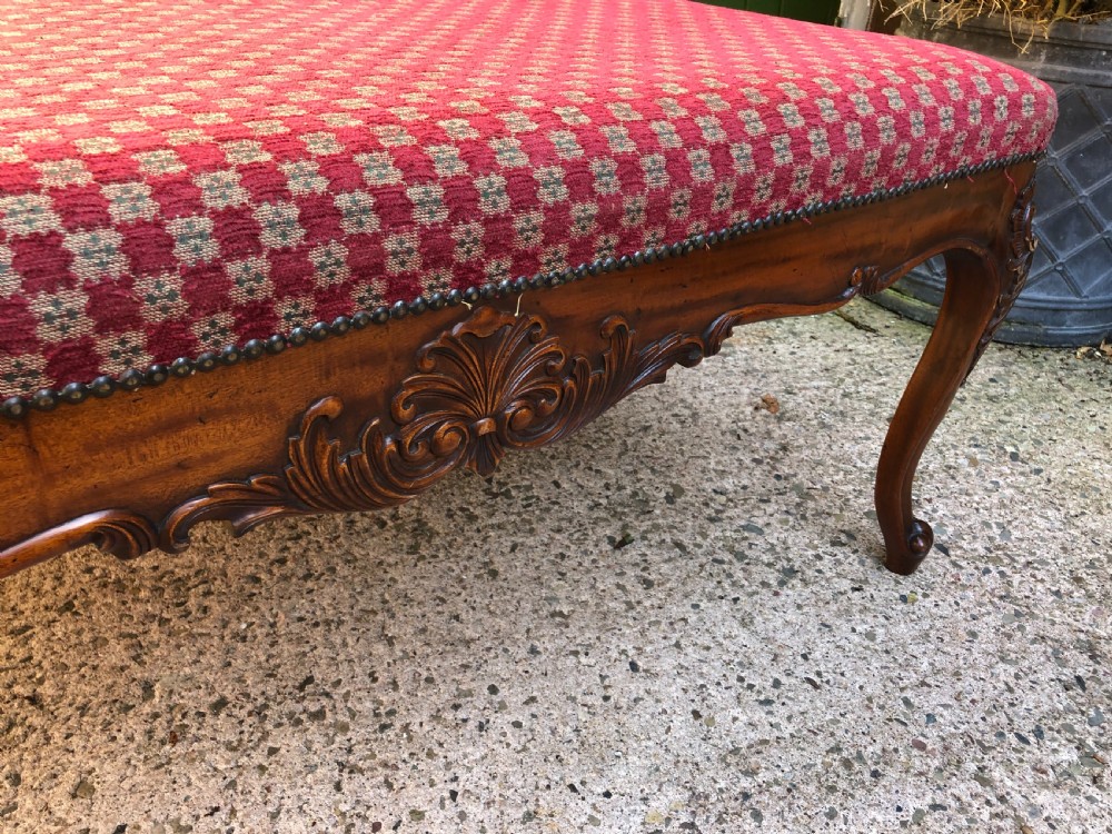 Large early C20th carved walnut-framed upholstered stool of mid C19th design. View VIII