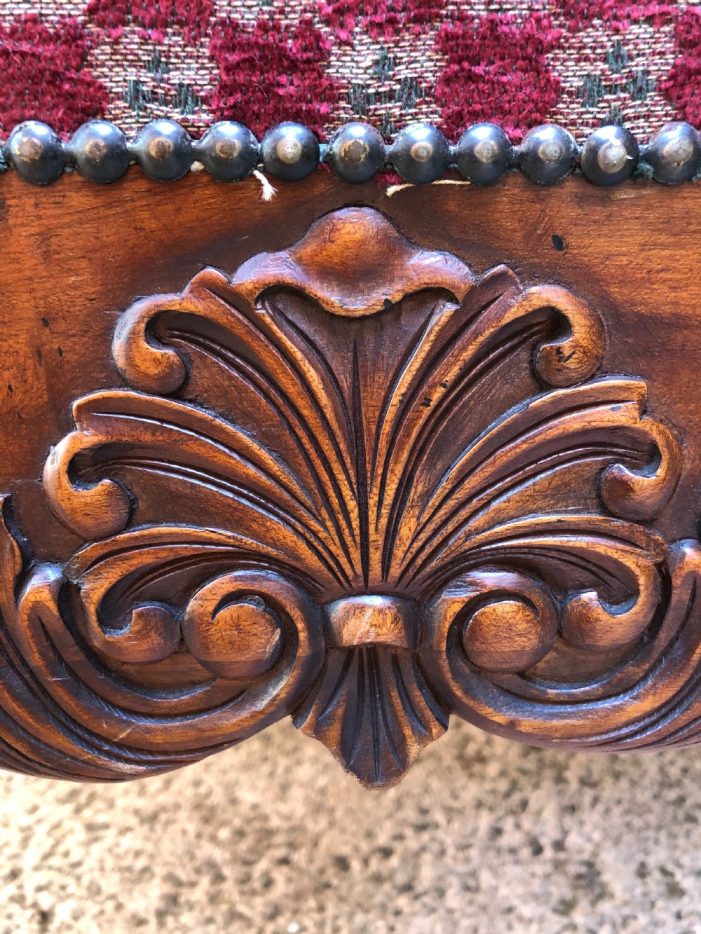 Large early C20th carved walnut-framed upholstered stool of mid C19th design. View IX