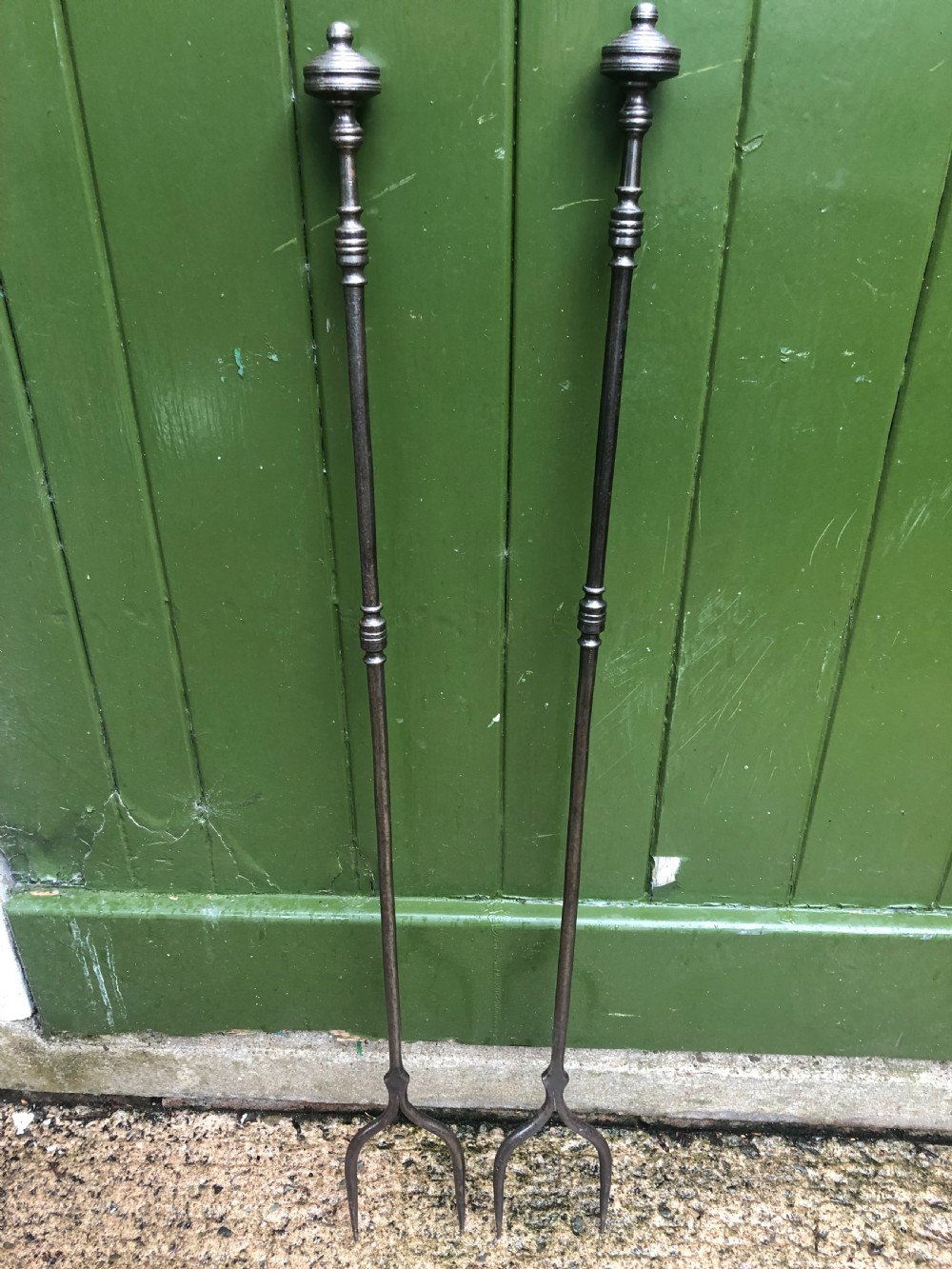 Rare pair of late C18th George III period ‘country-house’ steel fire-place log forks . View II