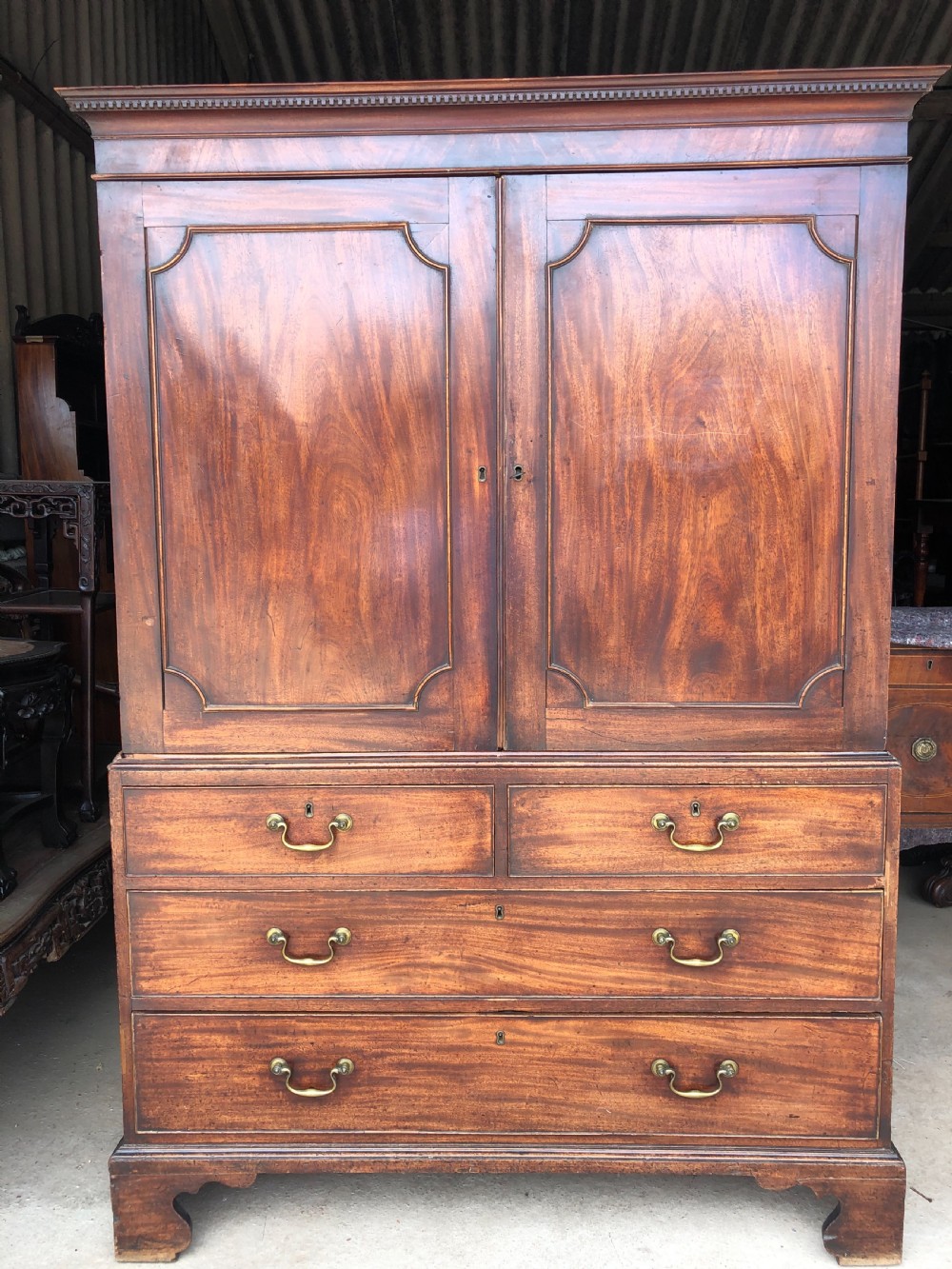 Late C18th George III period mahogany linen-press of small proportions. View IX
