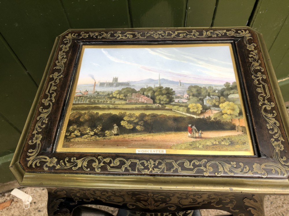 Rare early C19th brass marquetry inlaid table the top fitted with a porcelain plaque by Chamberlains of Worcester.  View XI