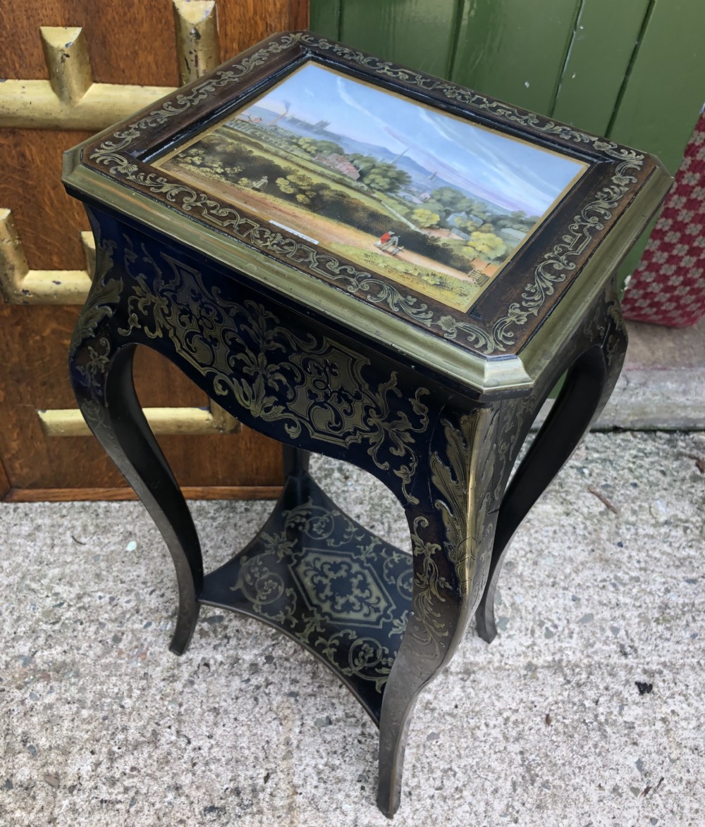 Rare early C19th brass marquetry inlaid table the top fitted with a porcelain plaque by Chamberlains of Worcester.  View XX