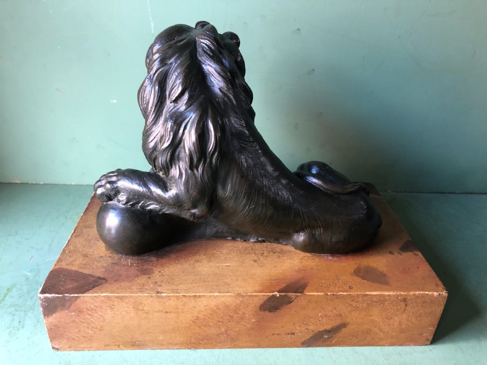Fine pair of C18th Italian bronze lions mounted on ‘faux’ marble decorated plinth bases . View V
