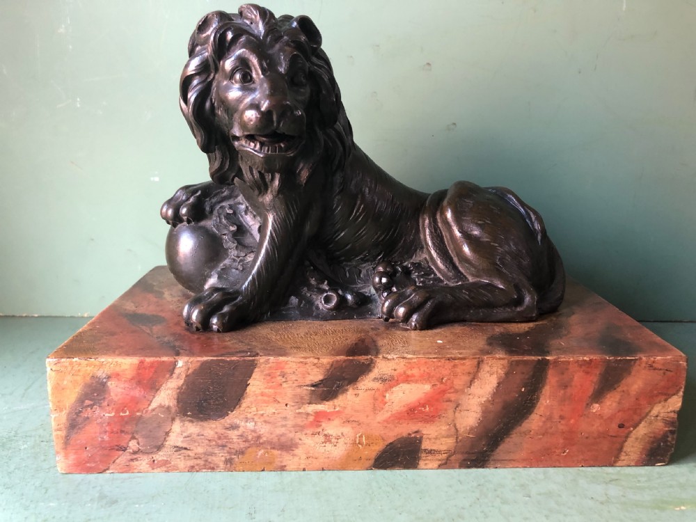 Fine pair of C18th Italian bronze lions mounted on ‘faux’ marble decorated plinth bases . View X
