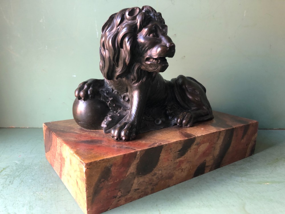 Fine pair of C18th Italian bronze lions mounted on ‘faux’ marble decorated plinth bases . View XI