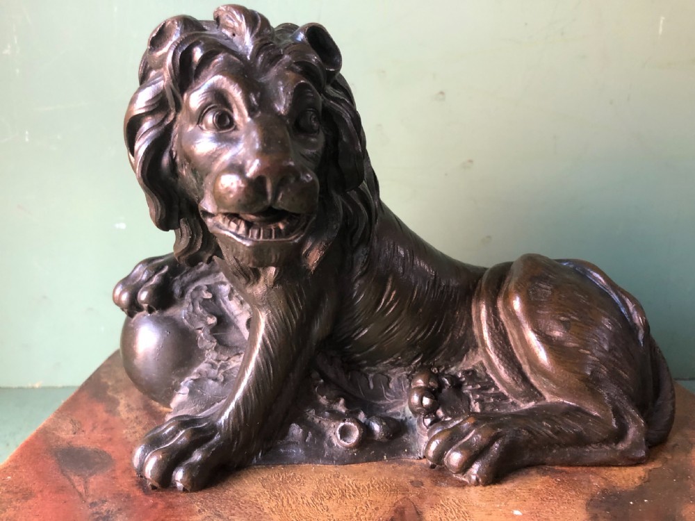 Fine pair of C18th Italian bronze lions mounted on ‘faux’ marble decorated plinth bases . View XII
