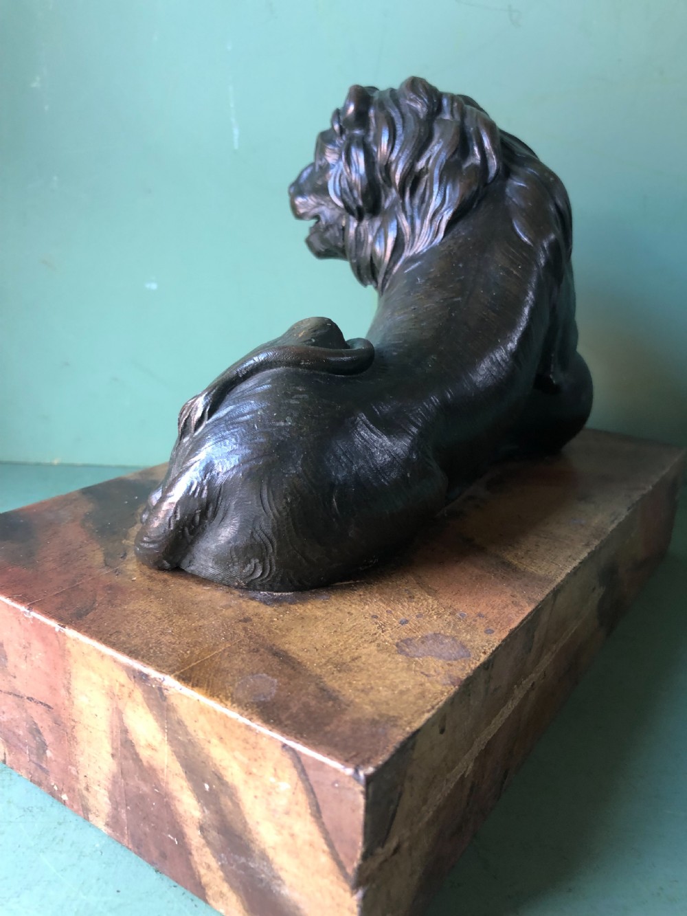 Fine pair of C18th Italian bronze lions mounted on ‘faux’ marble decorated plinth bases . View XVII
