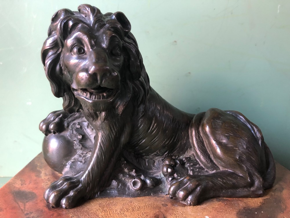 Fine pair of C18th Italian bronze lions mounted on ‘faux’ marble decorated plinth bases . View XVIII