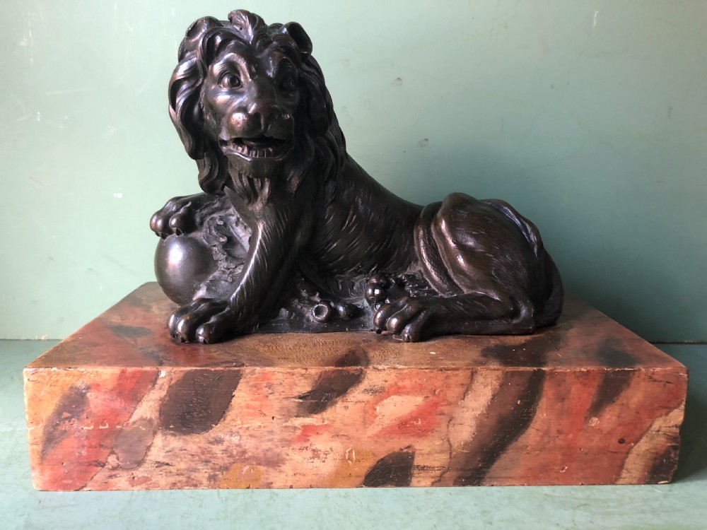 Fine pair of C18th Italian bronze lions mounted on ‘faux’ marble decorated plinth bases . View XIX