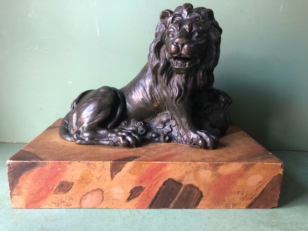 Fine pair of C18th Italian bronze lions mounted on ‘faux’ marble decorated plinth bases . View XX