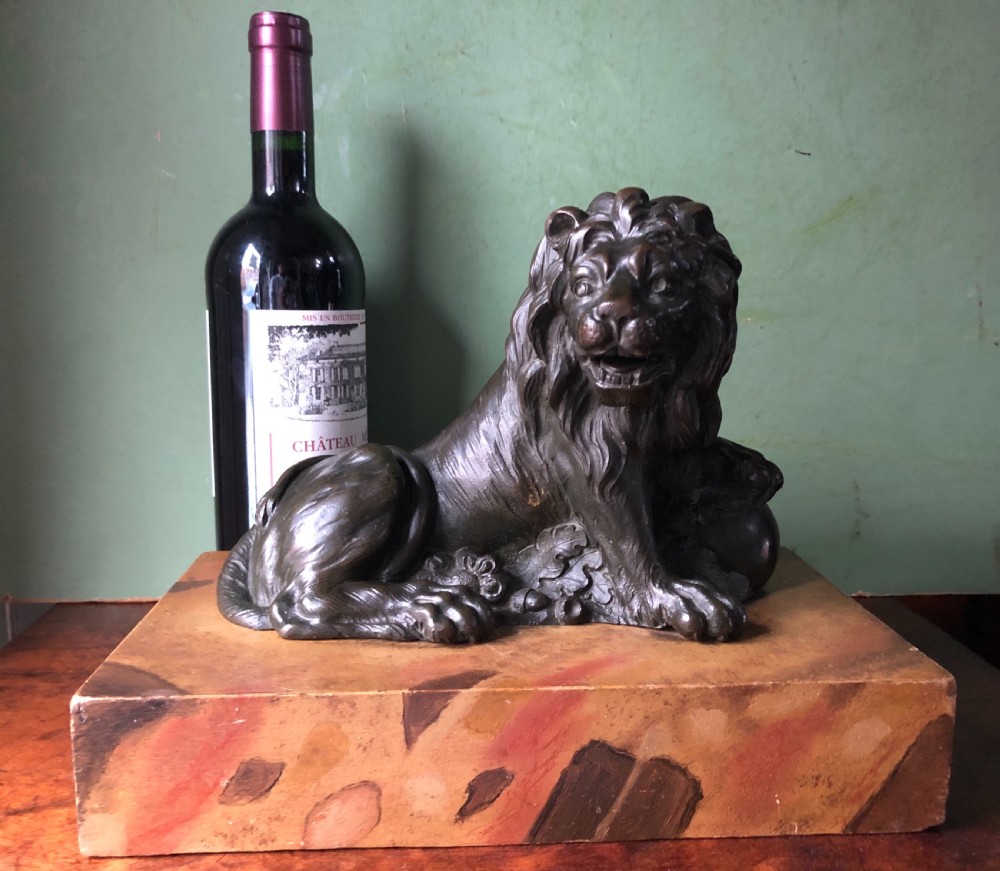 Fine pair of C18th Italian bronze lions mounted on ‘faux’ marble decorated plinth bases . View XXI