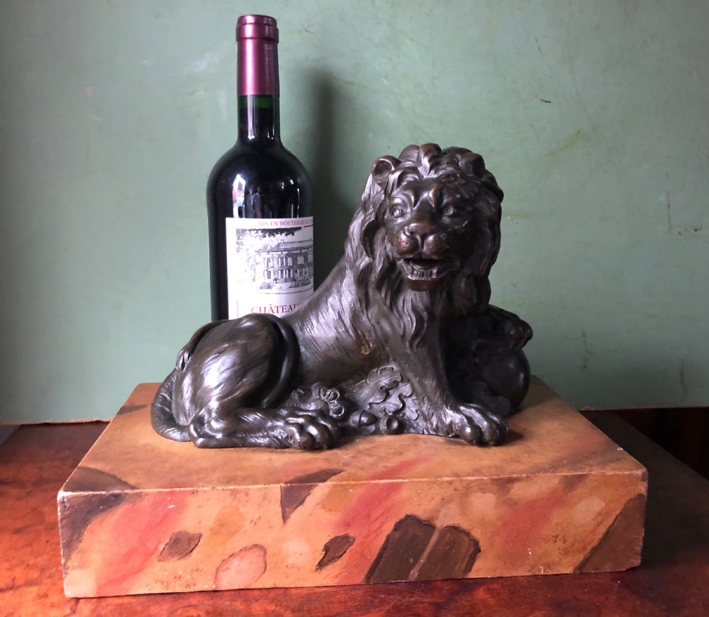 Fine pair of C18th Italian bronze lions mounted on ‘faux’ marble decorated plinth bases . View XXIII
