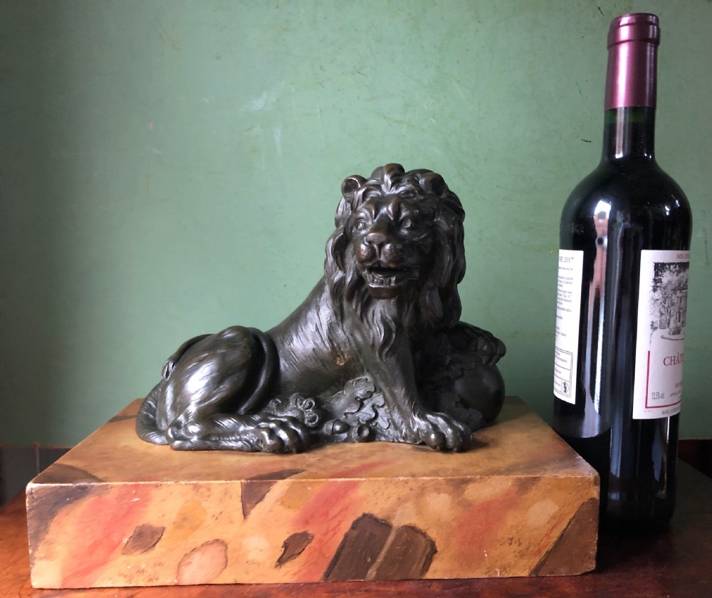 Fine pair of C18th Italian bronze lions mounted on ‘faux’ marble decorated plinth bases . View XXIV