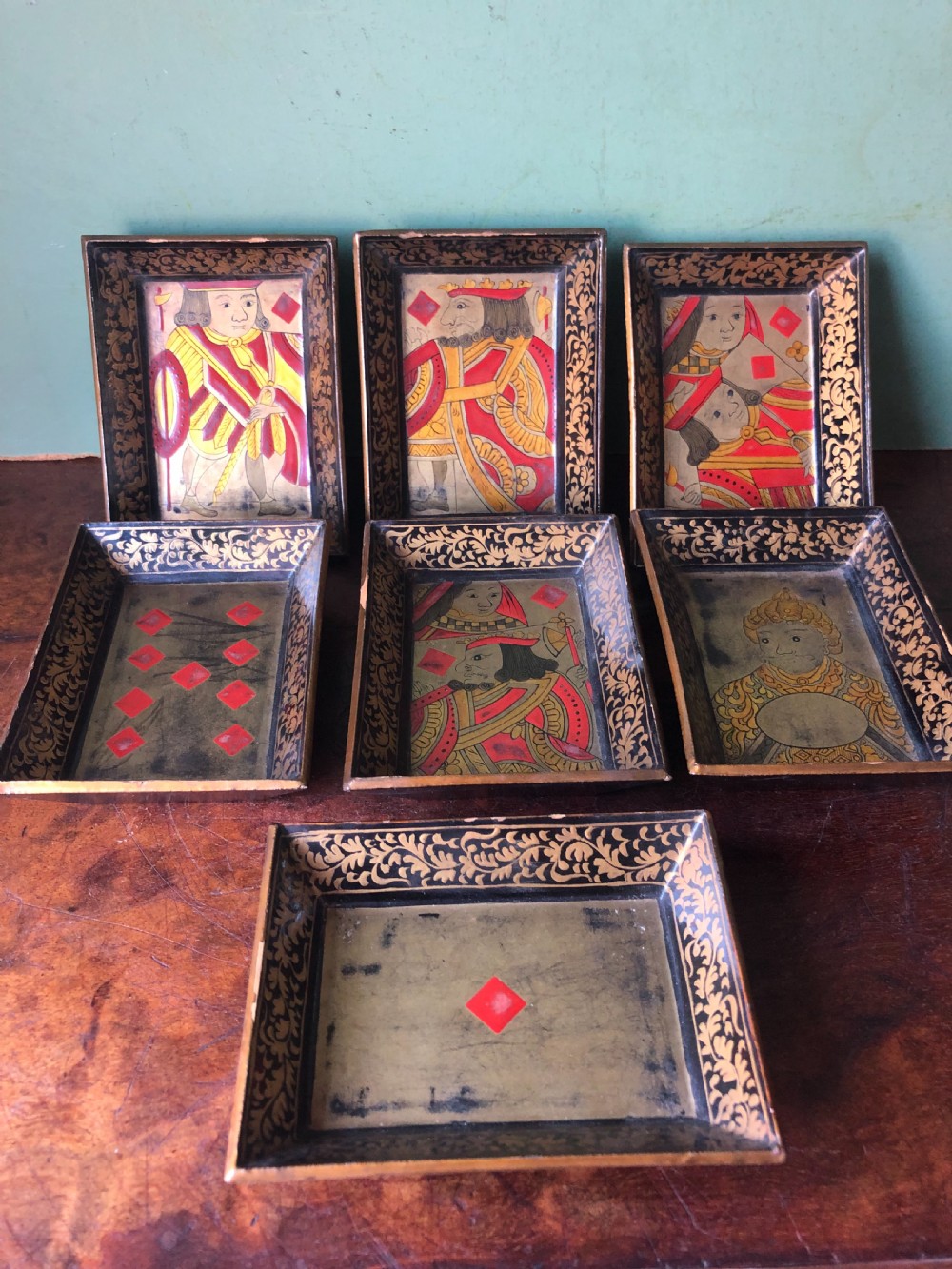 Interesting and decorative set of 7 mid C19th Chinese Export lacquer miniature trays for holding gambling chips . View II