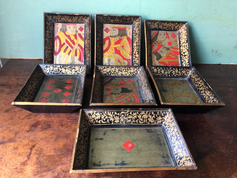 Interesting and decorative set of 7 mid C19th Chinese Export lacquer miniature trays for holding gambling chips . View VII