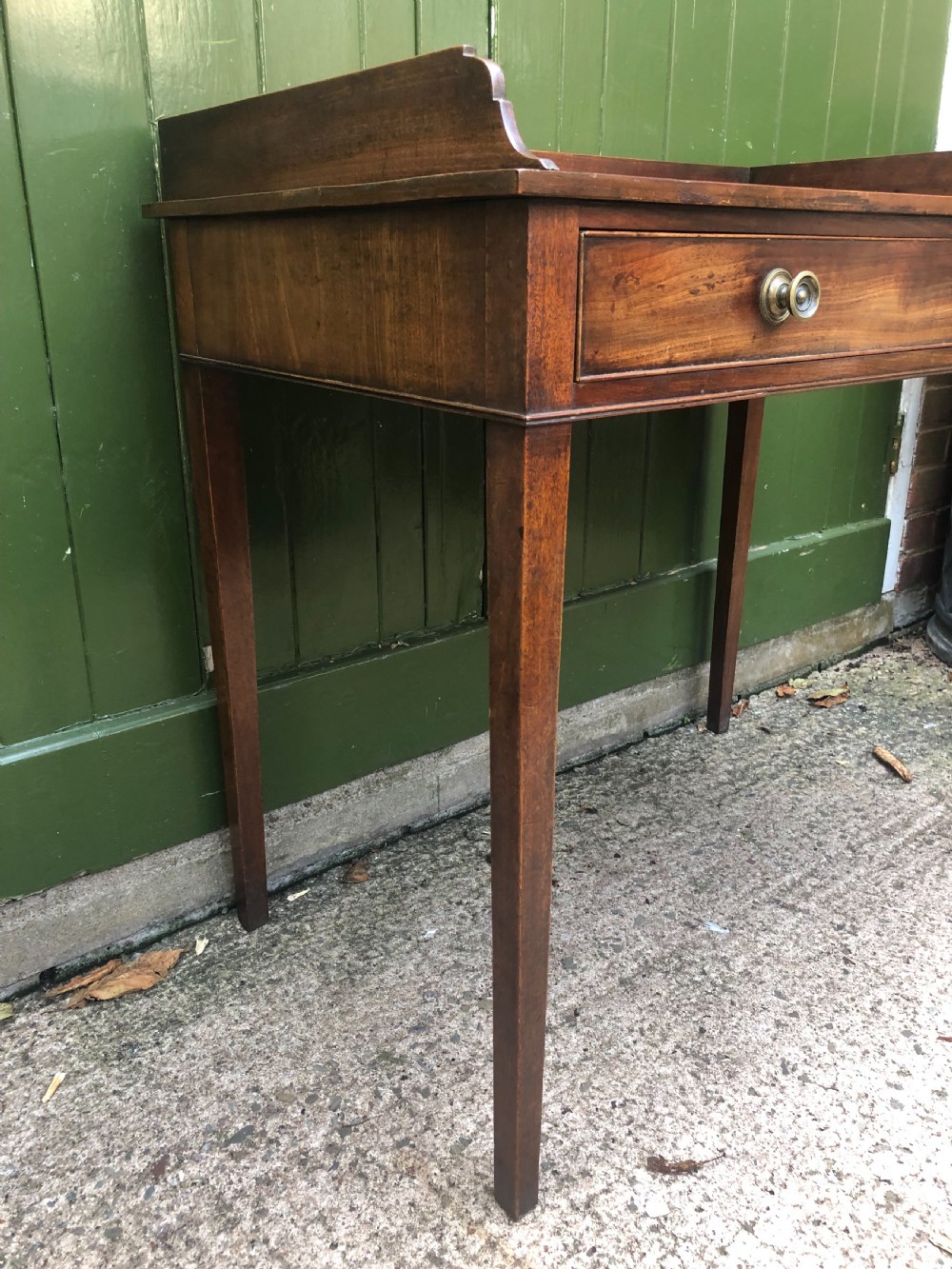 Elegant late C18th George III period mahogany dressing table of restrained design. View IV