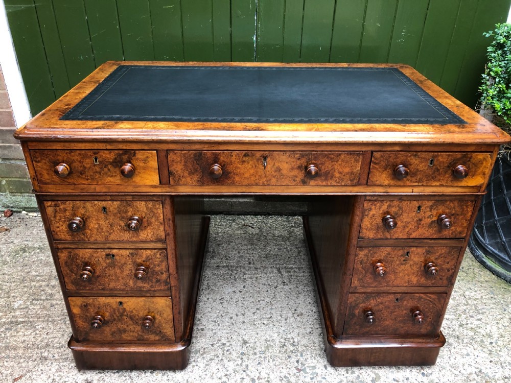 Good quality mid C19th burr and figured walnut pedestal knee-hole writing desk .