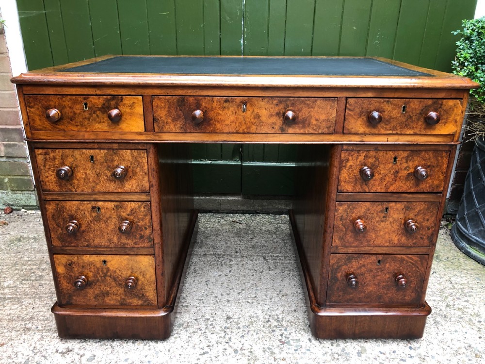 Good quality mid C19th burr and figured walnut pedestal knee-hole writing desk . View II