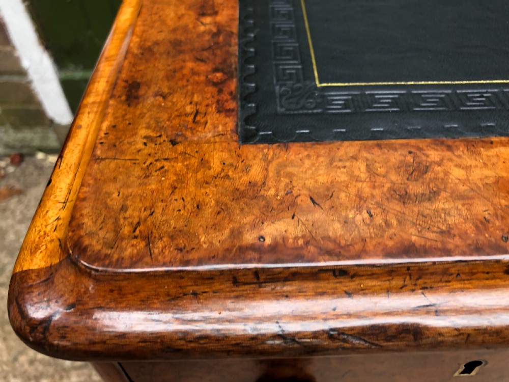 Good quality mid C19th burr and figured walnut pedestal knee-hole writing desk . View VI
