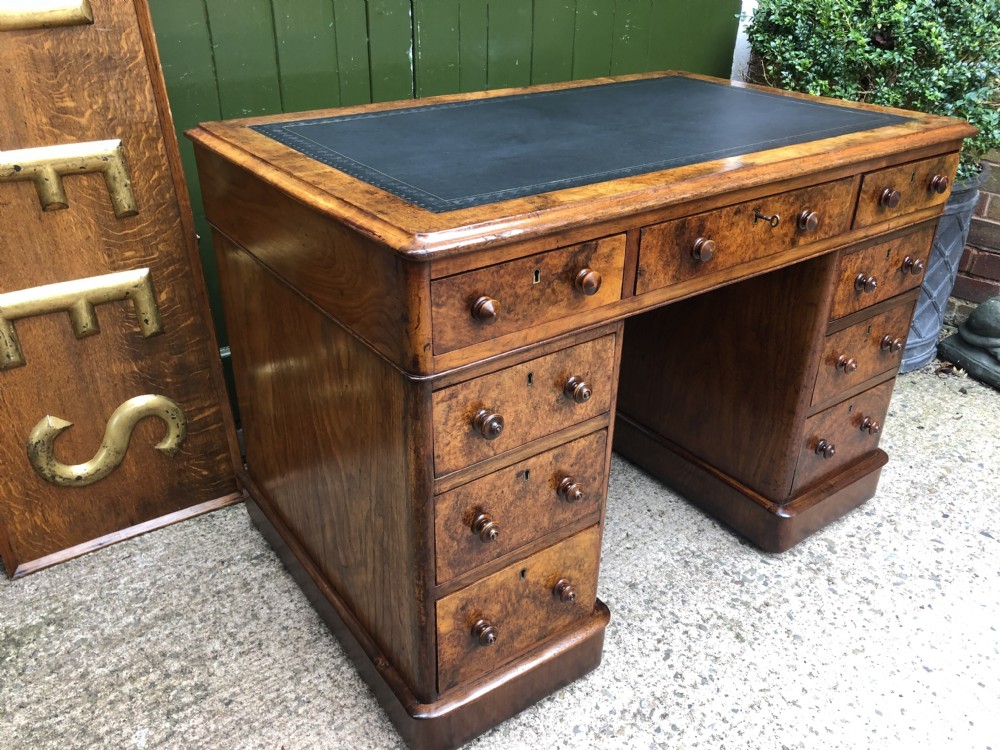 Good quality mid C19th burr and figured walnut pedestal knee-hole writing desk . View XXI