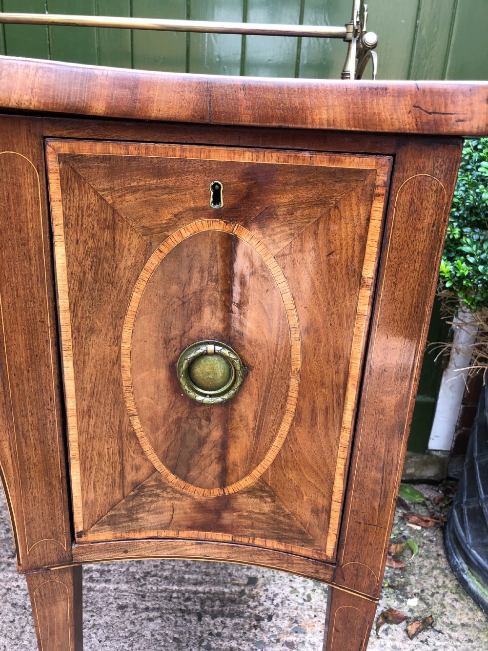 Fine late C18th George III Sheraton period mahogany serpentine front sideboard of compact proportions. View VIII