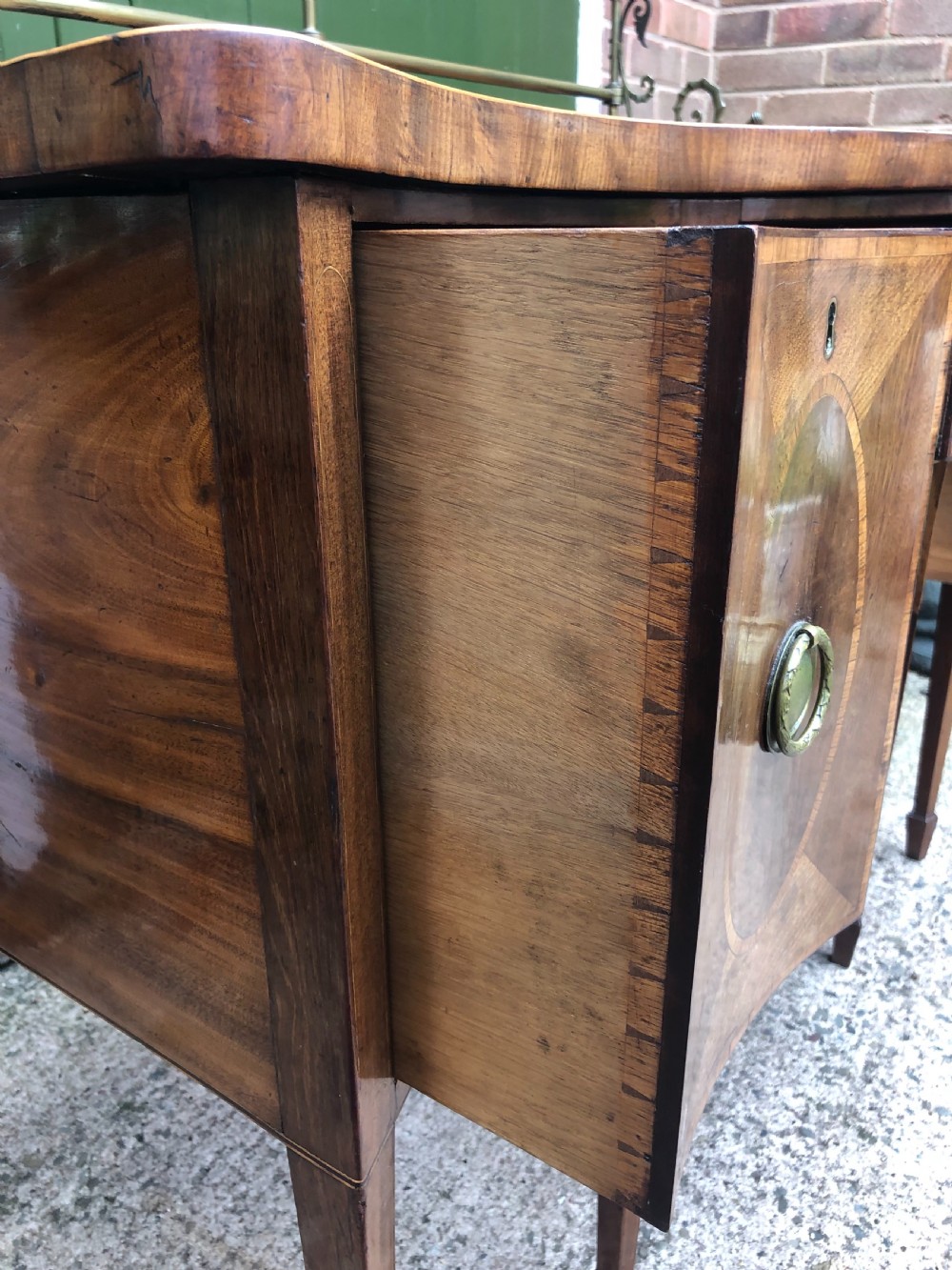 Fine late C18th George III Sheraton period mahogany serpentine front sideboard of compact proportions. View XII