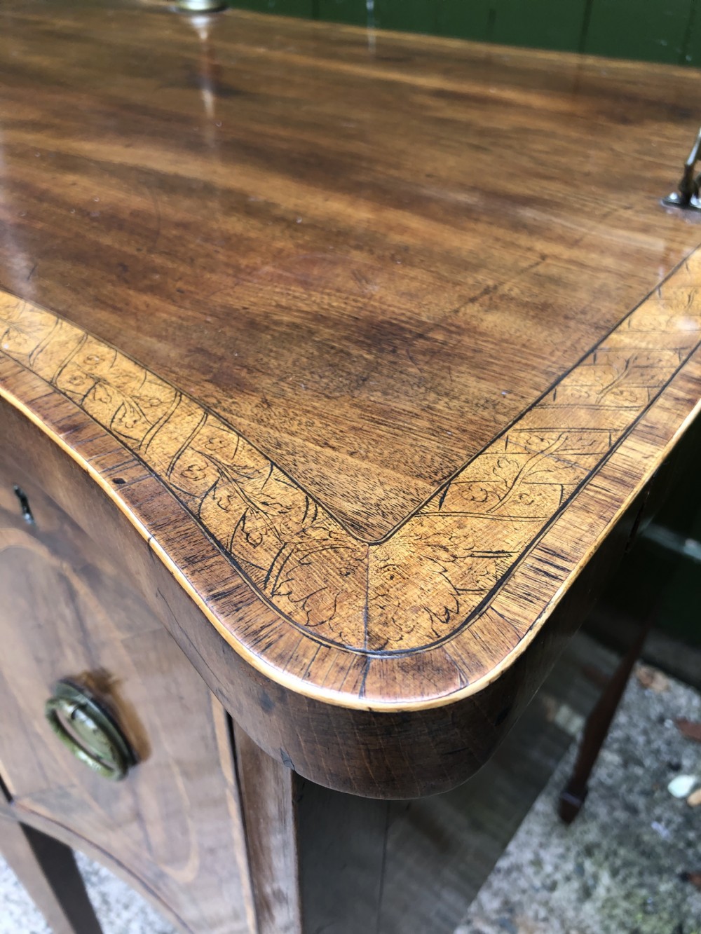 Fine late C18th George III Sheraton period mahogany serpentine front sideboard of compact proportions. View XV