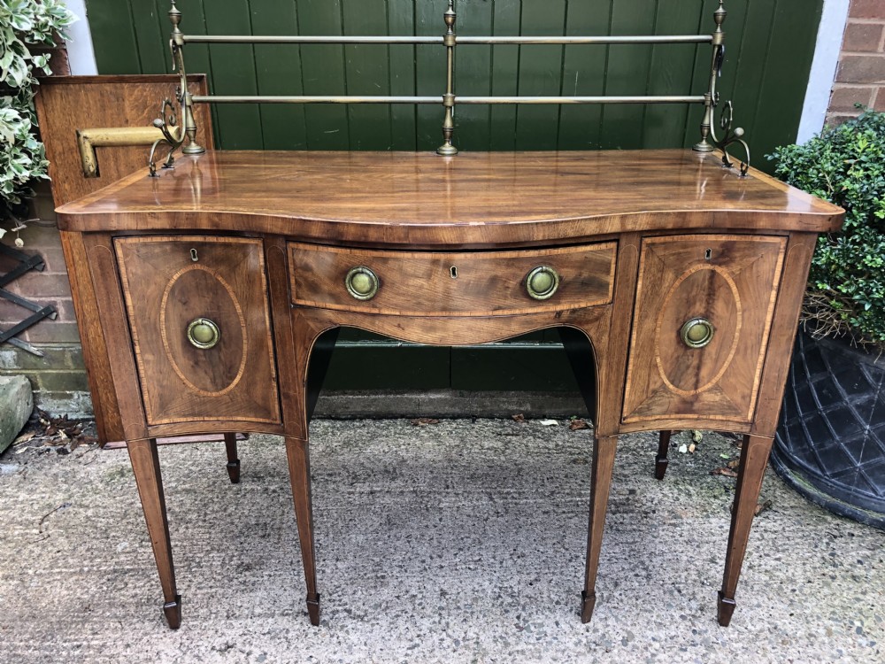 Fine late C18th George III Sheraton period mahogany serpentine front sideboard of compact proportions. View XXII