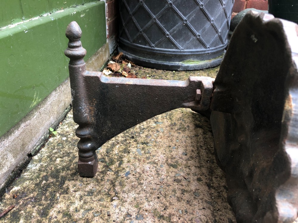 Pair of mid C19th cast-iron boot-scrapers in the form of a recumbent lion and a unicorn .  View IV