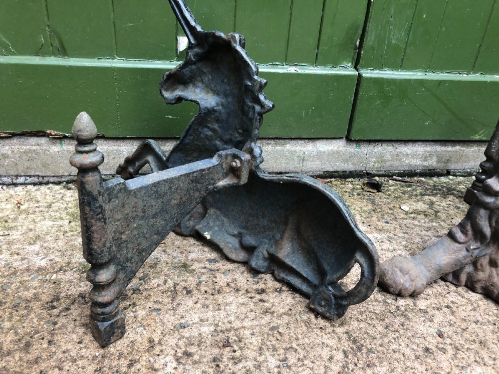 Pair of mid C19th cast-iron boot-scrapers in the form of a recumbent lion and a unicorn .  View VII