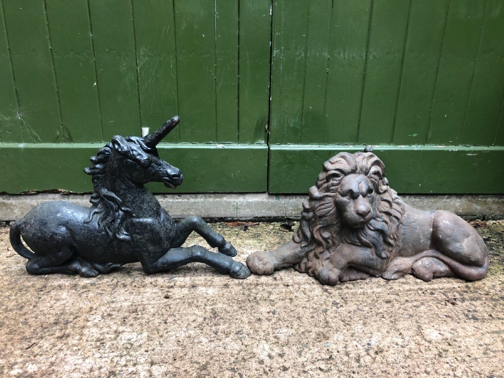 Pair of mid C19th cast-iron boot-scrapers in the form of a recumbent lion and a unicorn .  View X