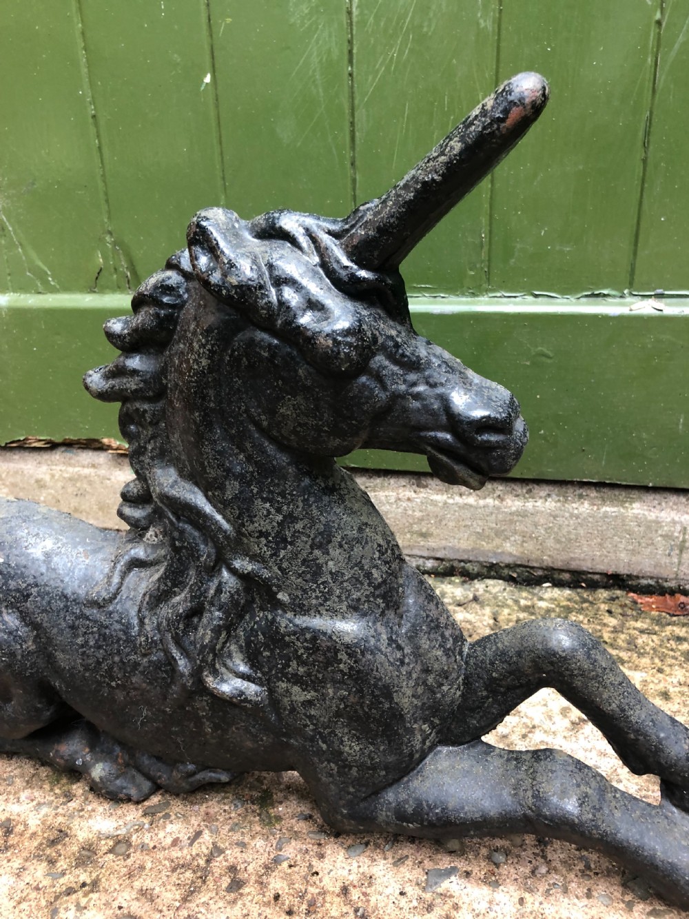 Pair of mid C19th cast-iron boot-scrapers in the form of a recumbent lion and a unicorn .  View XII