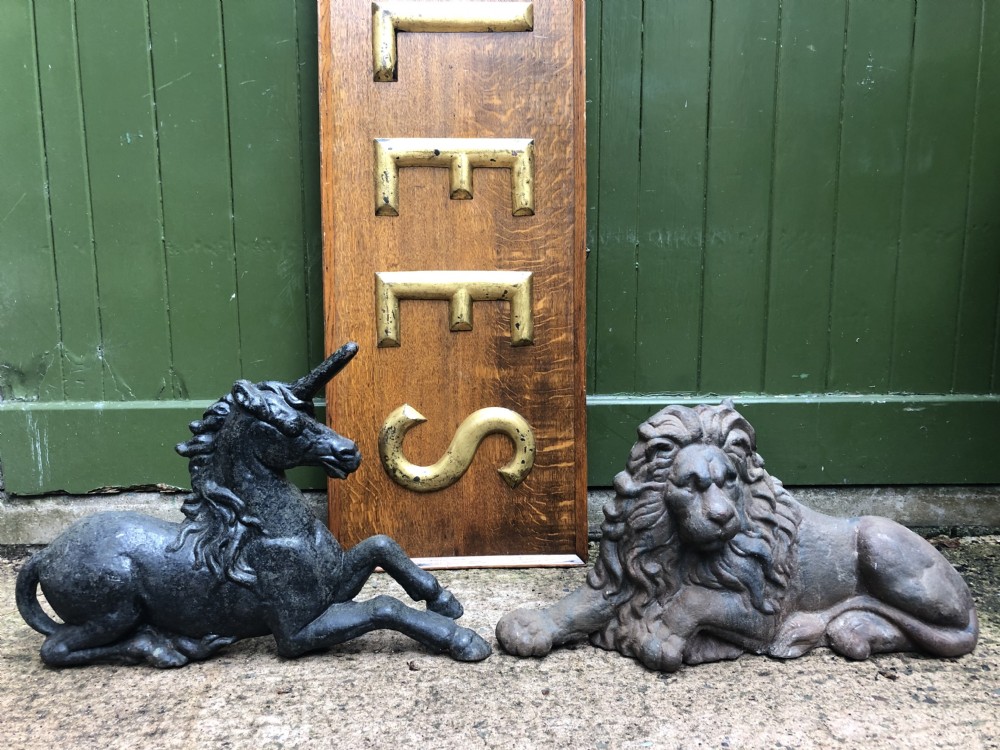 Pair of mid C19th cast-iron boot-scrapers in the form of a recumbent lion and a unicorn .  View XIII