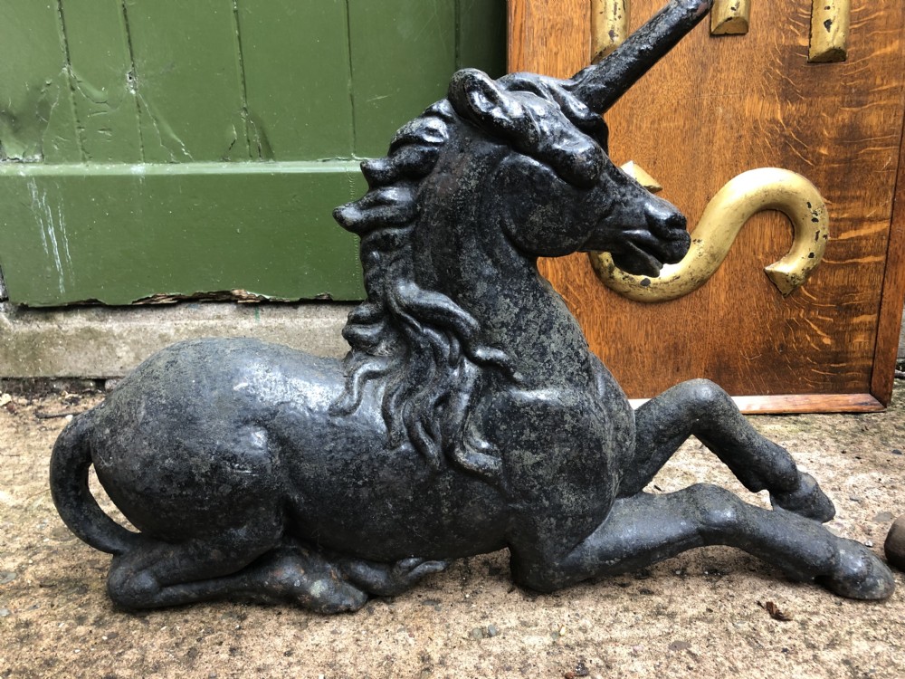 Pair of mid C19th cast-iron boot-scrapers in the form of a recumbent lion and a unicorn .  View XV