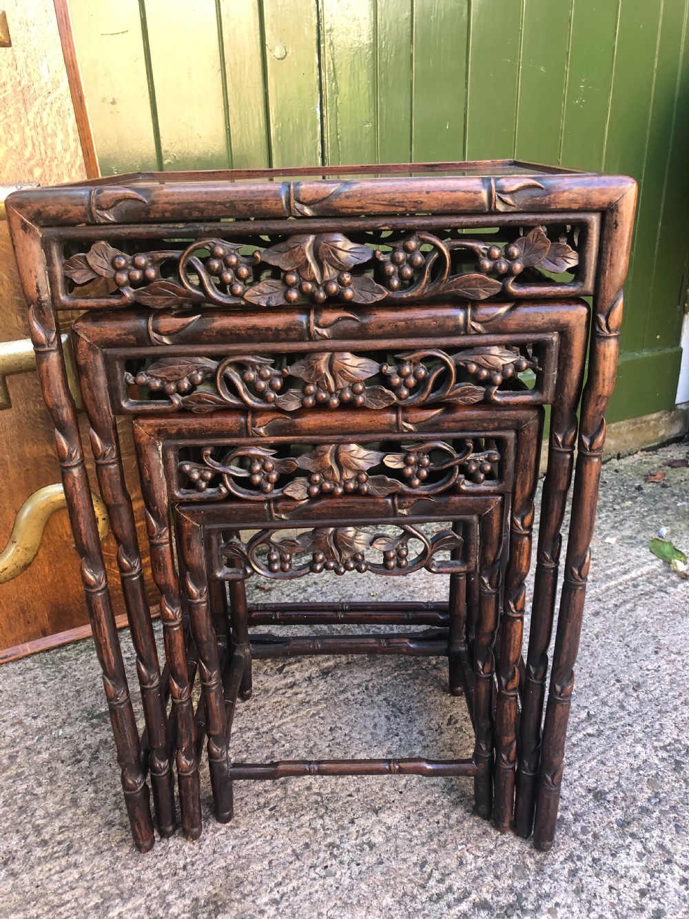 Nest of 4 late C19th Chinese Qing Dynasty carved hardwood graduated tables.