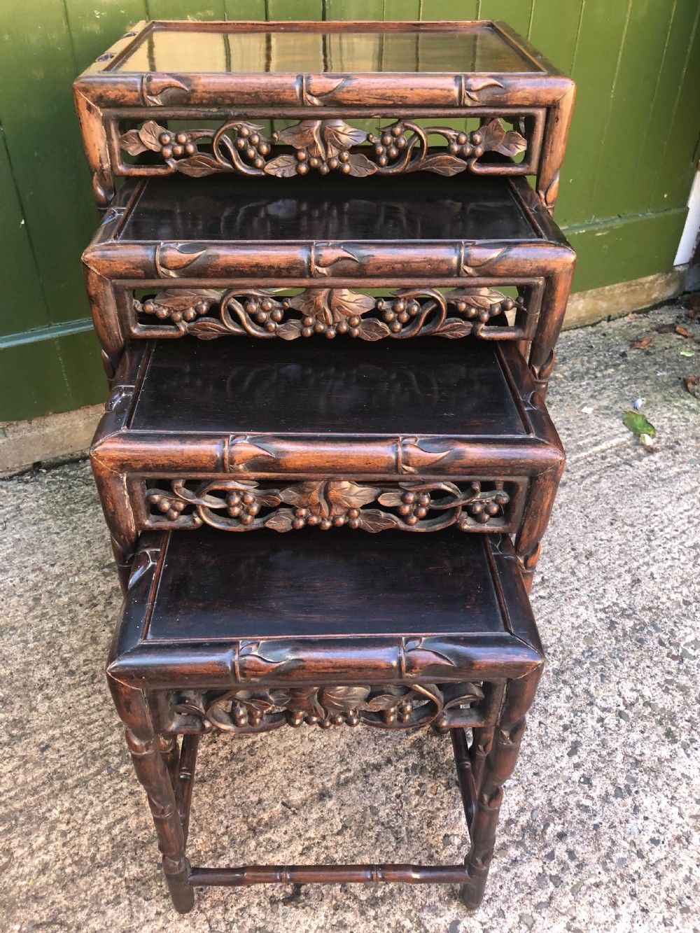 Nest of 4 late C19th Chinese Qing Dynasty carved hardwood graduated tables. View III