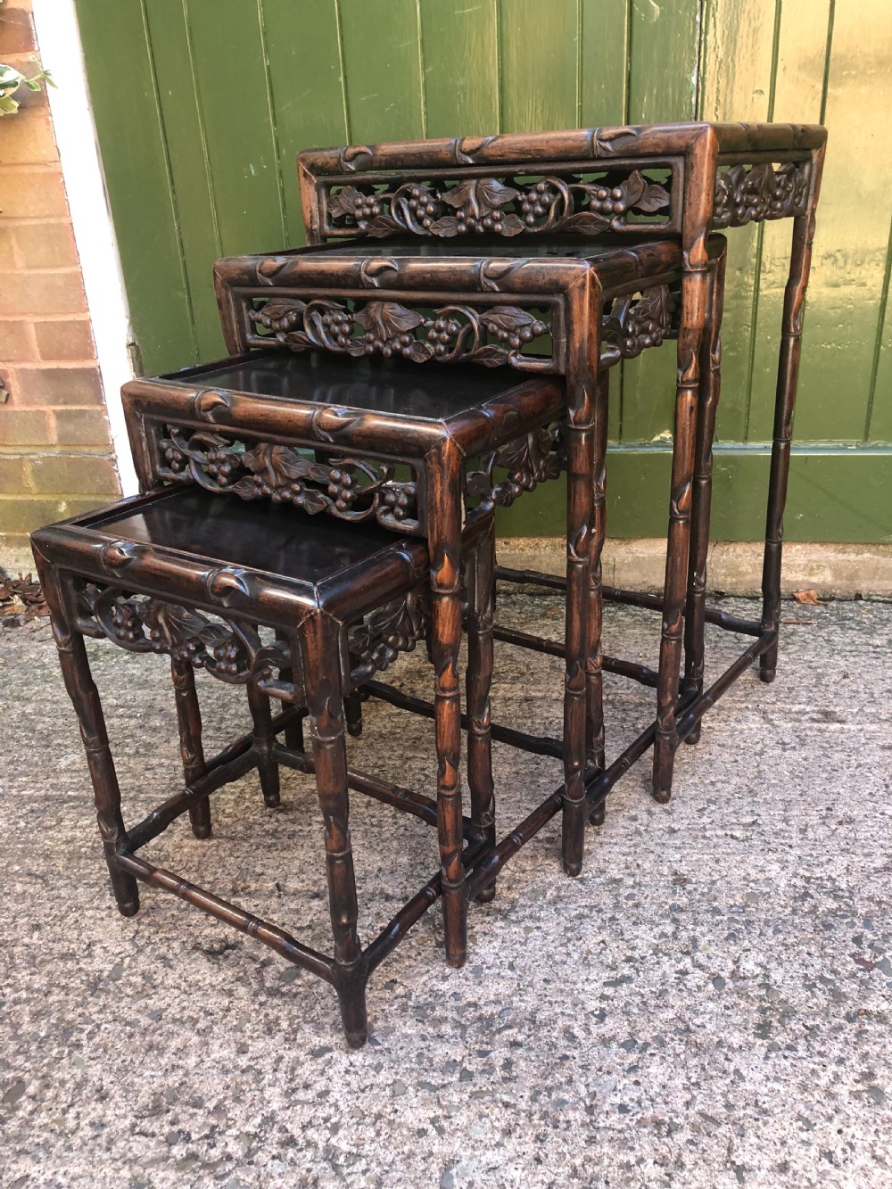 Nest of 4 late C19th Chinese Qing Dynasty carved hardwood graduated tables. View V