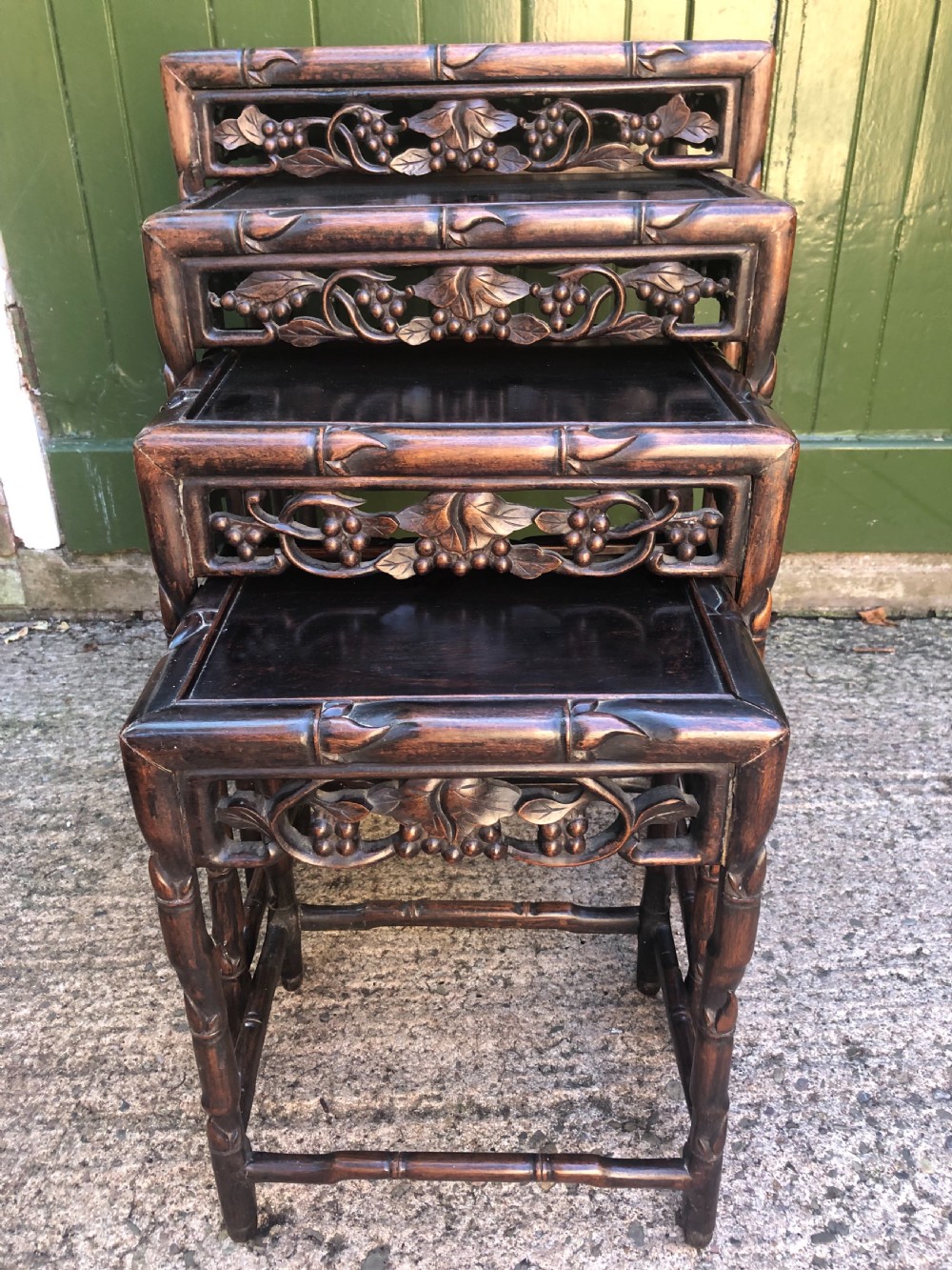 Nest of 4 late C19th Chinese Qing Dynasty carved hardwood graduated tables. View VIII