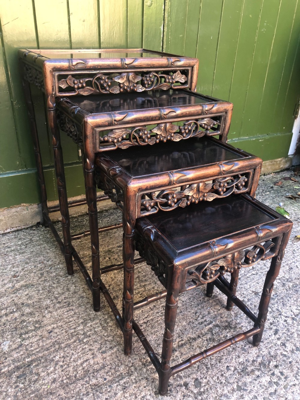 Nest of 4 late C19th Chinese Qing Dynasty carved hardwood graduated tables. View IX